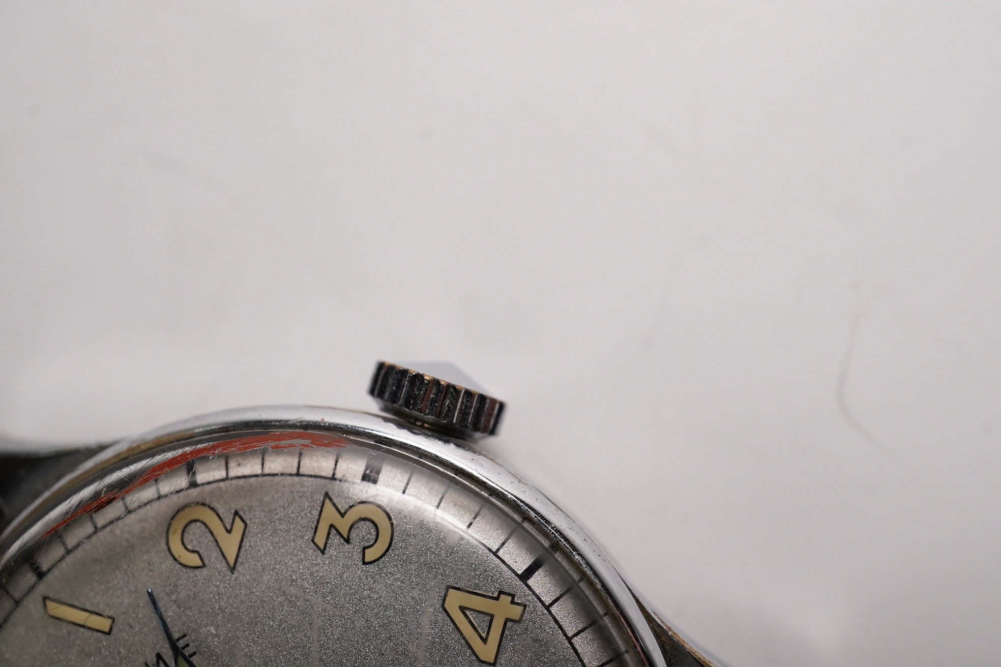 A gentleman's steel Russian manual wind wrist watch, the dial inscribed Kupoba, with Arabic dial, case diameter 34mm. Condition - poor